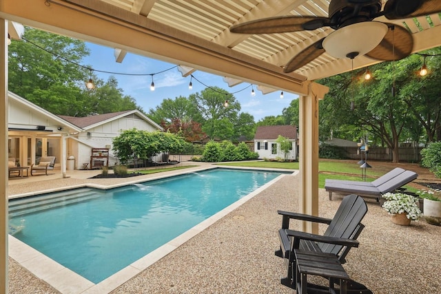 view of pool with a patio, ceiling fan, a fenced in pool, an outdoor structure, and fence private yard