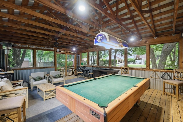 recreation room with pool table, vaulted ceiling, and hardwood / wood-style flooring
