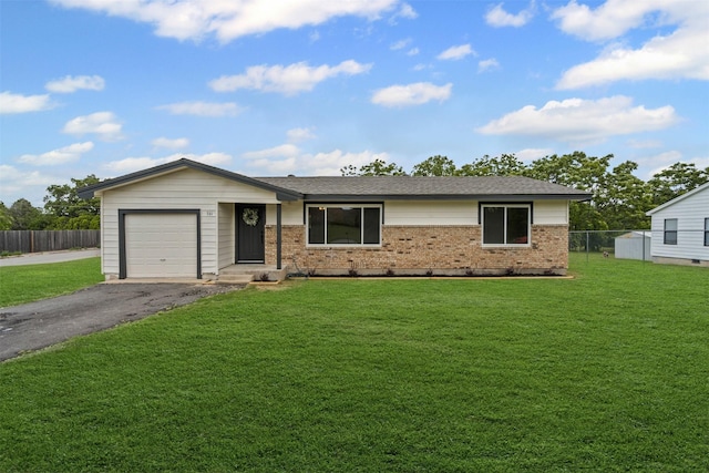 701 E 2nd St, Weatherford, TX 76086 - ranch-style house featuring driveway, brick siding, an attached garage, and roof with shingles