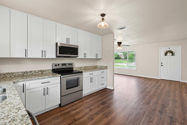 kitchen with visible vents, white cabinetry, a ceiling fan, dark wood finished floors, and appliances with stainless steel finishes