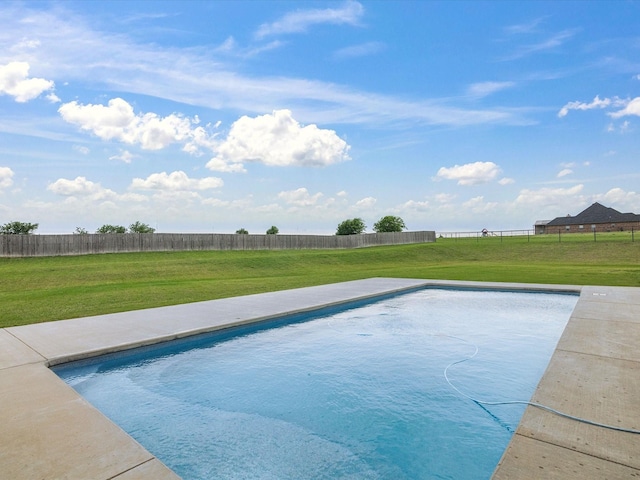 view of pool with a fenced in pool, a fenced backyard, and a yard