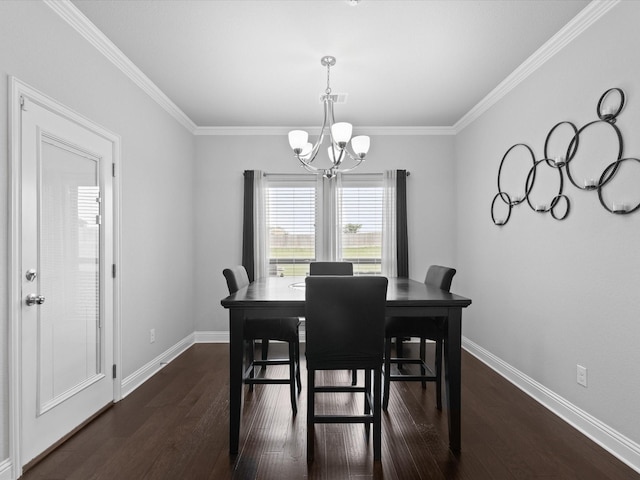 dining area with visible vents, baseboards, dark wood-style floors, a chandelier, and ornamental molding