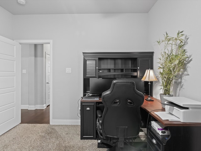 office with carpet floors and baseboards