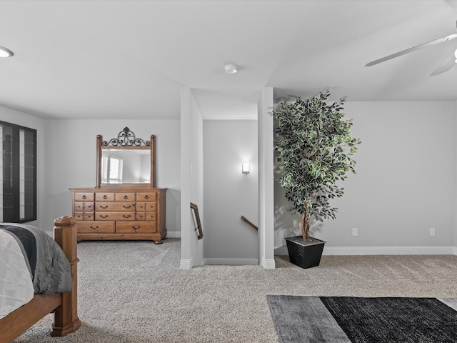 bedroom with carpet flooring and baseboards