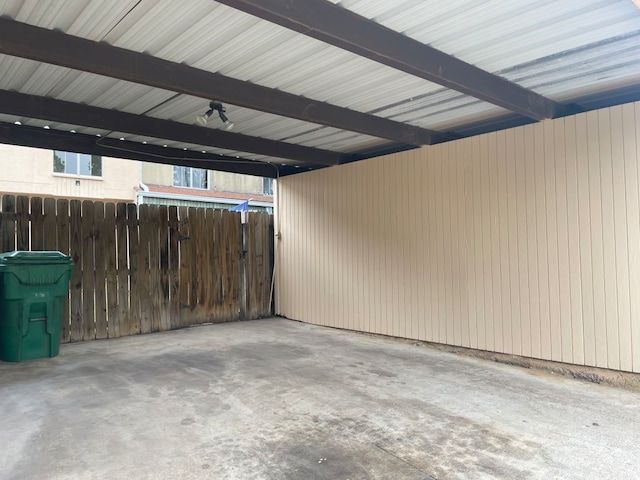 garage featuring fence