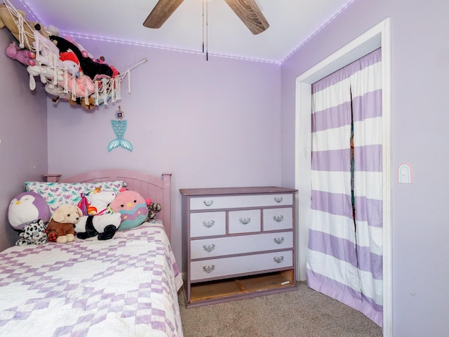 carpeted bedroom featuring ceiling fan
