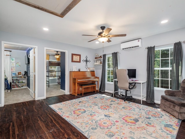 interior space with baseboards, a wall mounted air conditioner, wood finished floors, and recessed lighting