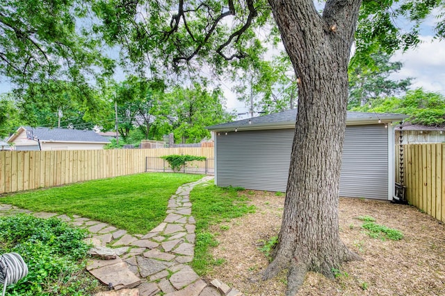view of yard with a fenced backyard