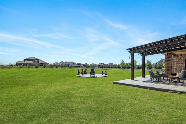view of yard featuring fence, a pergola, and a patio area