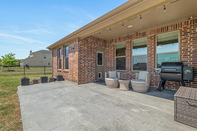 view of patio / terrace with fence and area for grilling
