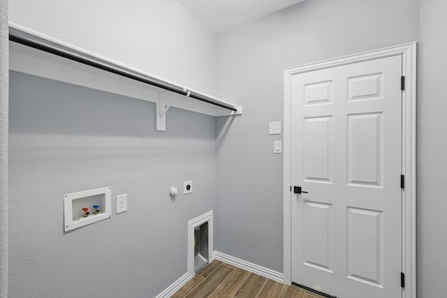 laundry area with laundry area, dark wood-style floors, electric dryer hookup, baseboards, and hookup for a washing machine