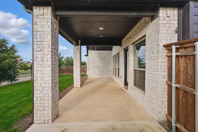 view of patio with fence