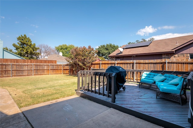 wooden terrace with area for grilling, a lawn, a patio area, a fenced backyard, and outdoor lounge area