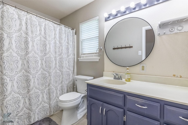 full bathroom featuring vanity, tile patterned flooring, toilet, and a shower with shower curtain