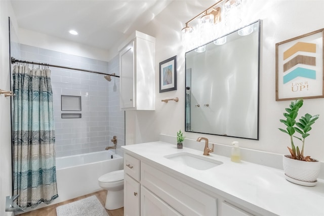 full bath featuring vanity, recessed lighting, shower / bathtub combination with curtain, and toilet