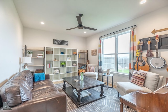 living area with recessed lighting, a ceiling fan, and wood finished floors