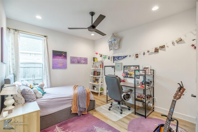 bedroom with a ceiling fan, recessed lighting, and wood finished floors