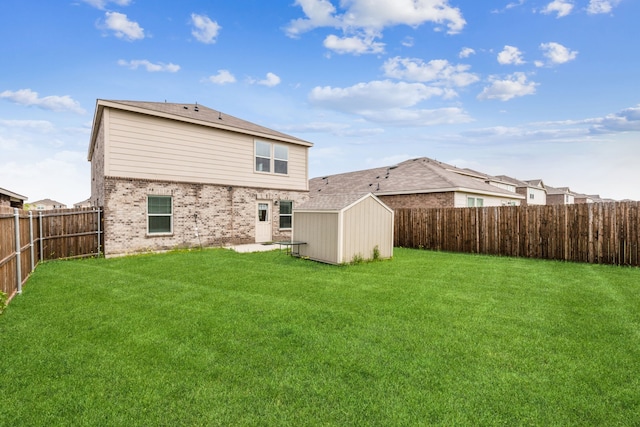 1510 Vega Dr, Forney, TX 75126 - rear view of property featuring a lawn, a fenced backyard, and a storage unit