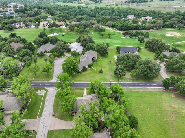 birds eye view of property with a residential view and golf course view
