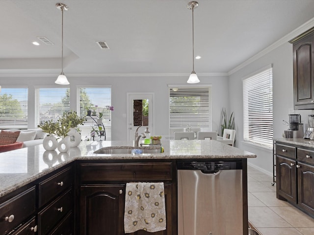 kitchen featuring stainless steel dishwasher, a sink, light tile patterned floors, and visible vents