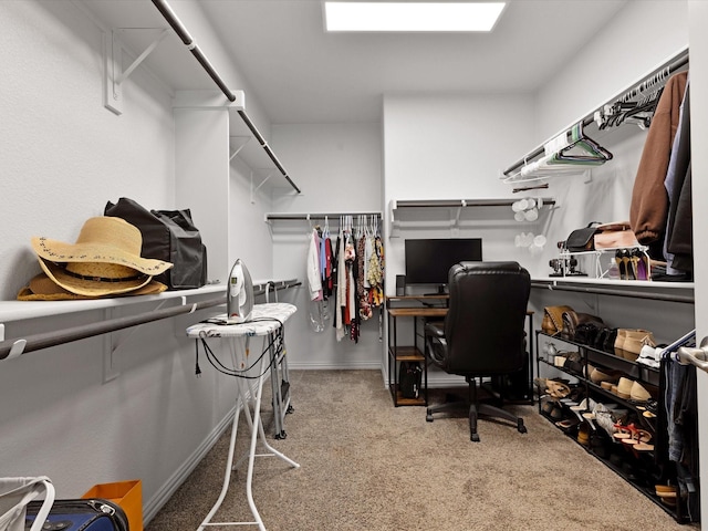 spacious closet with carpet flooring