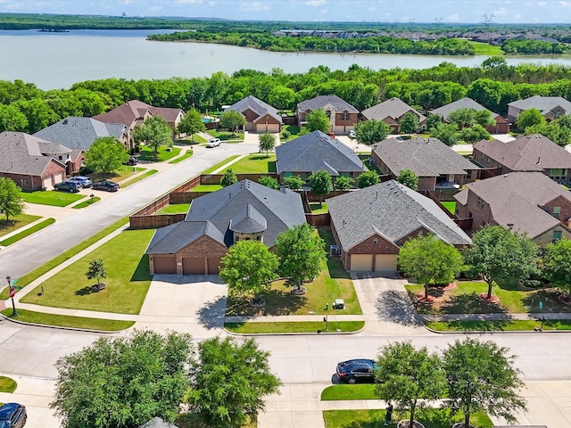 aerial view featuring a water view and a residential view