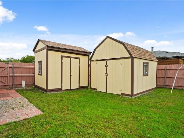 view of shed featuring a fenced backyard