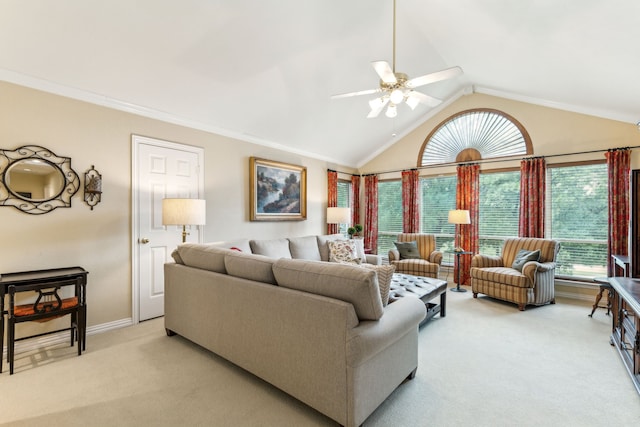 living area with a ceiling fan, baseboards, light colored carpet, and lofted ceiling