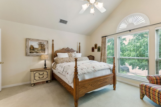 bedroom with baseboards, ceiling fan, light colored carpet, and visible vents