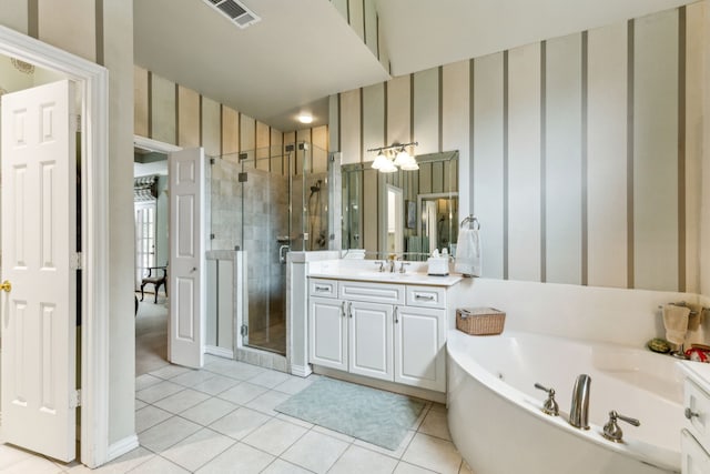 full bath featuring visible vents, a garden tub, vanity, tile patterned flooring, and a shower stall