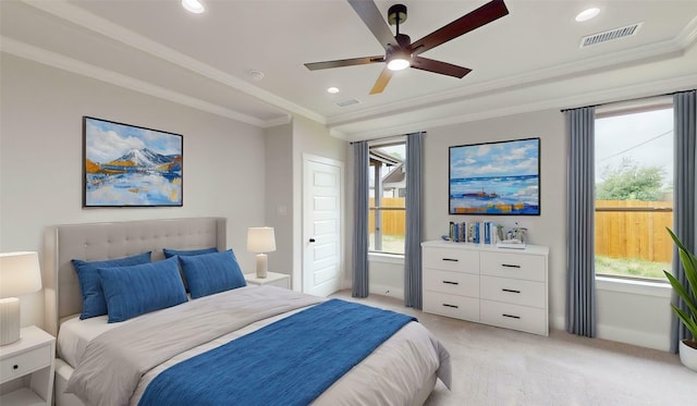 bedroom with visible vents, recessed lighting, crown molding, and light carpet