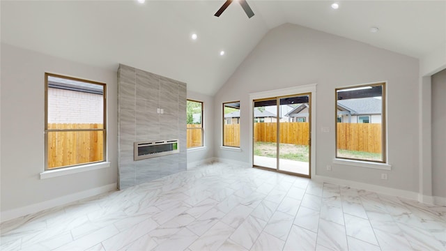unfurnished living room featuring a fireplace, marble finish floor, a ceiling fan, recessed lighting, and heating unit