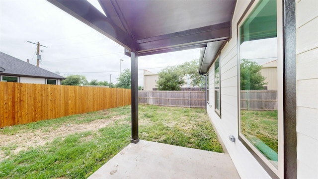 view of yard featuring a patio and a fenced backyard