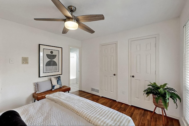 bedroom with wood finished floors and a ceiling fan