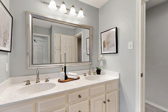 full bathroom featuring double vanity