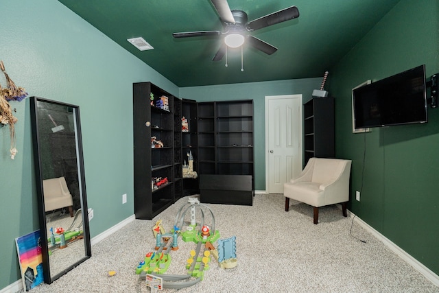 rec room featuring visible vents, a ceiling fan, carpet, and baseboards