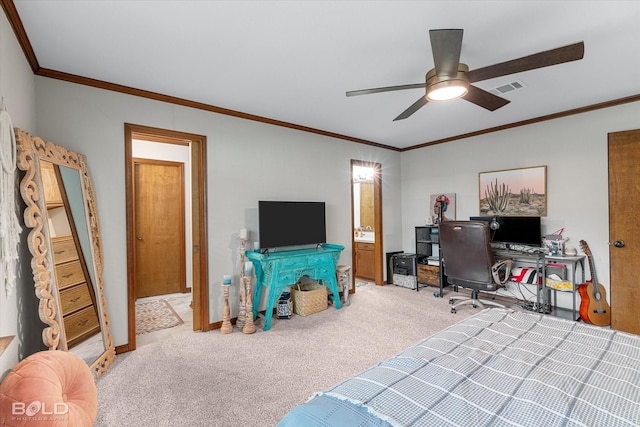 carpeted bedroom with visible vents, ornamental molding, and ceiling fan