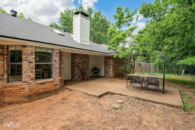view of patio / terrace with fence