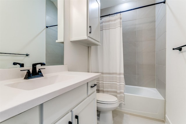 bathroom with vanity, shower / bath combo, and toilet