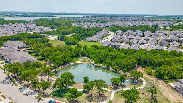 aerial view featuring a residential view and a water view