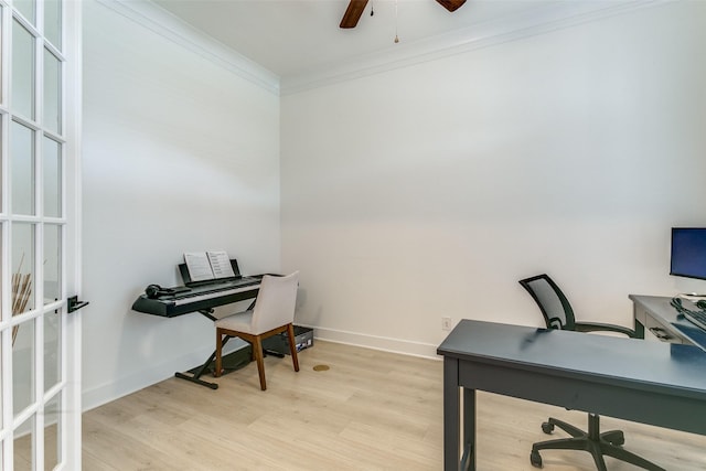 office space with ceiling fan, ornamental molding, baseboards, and light wood finished floors