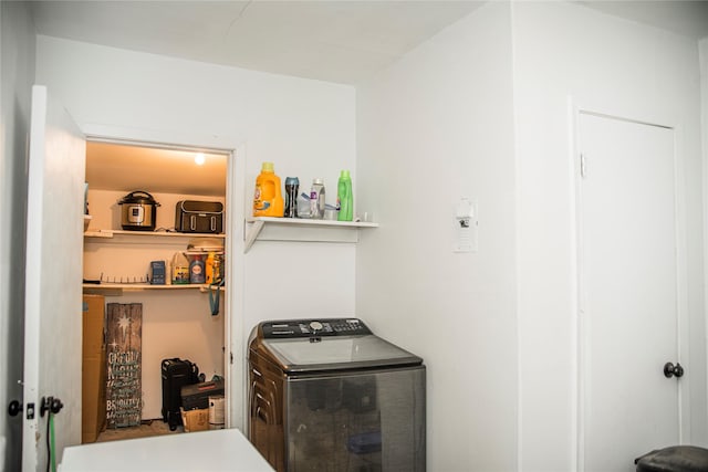 washroom featuring washer / clothes dryer and laundry area