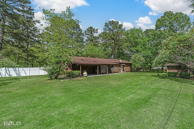 exterior space with fence and a patio