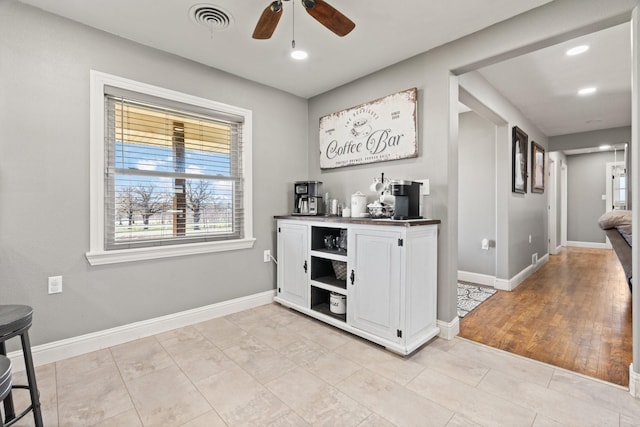 bar featuring ceiling fan, visible vents, light tile patterned floors, baseboards, and recessed lighting