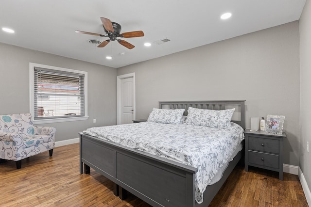 bedroom featuring visible vents, recessed lighting, baseboards, and wood finished floors