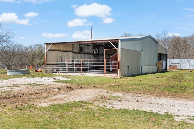 view of outbuilding featuring an outbuilding and an exterior structure