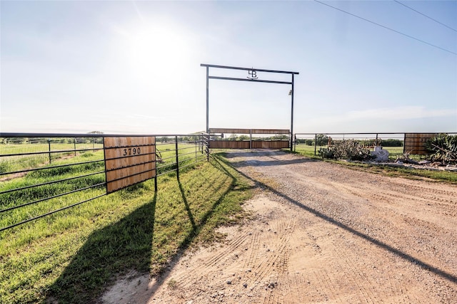 view of street featuring a rural view and driveway