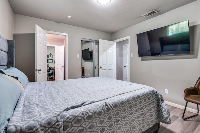 3467 Navajo Cir, Dallas, TX 75224 - bedroom with wood finished floors and baseboards