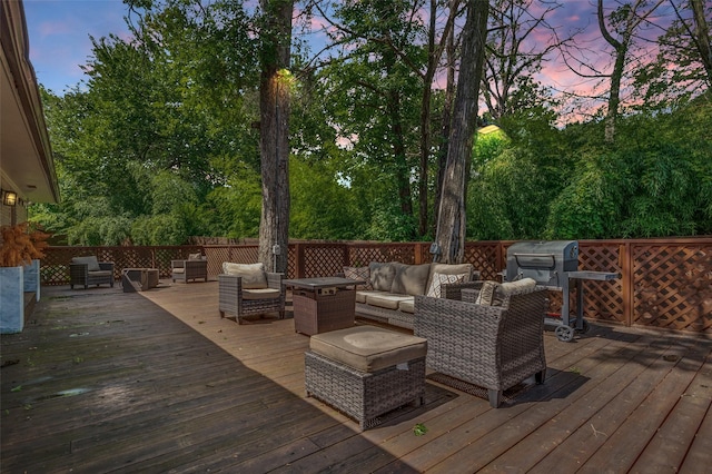 3467 Navajo Cir, Dallas, TX 75224 - deck at dusk with outdoor lounge area and area for grilling