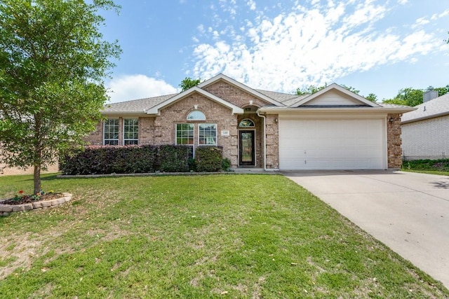 ranch-style home with an attached garage, concrete driveway, brick siding, and a front yard